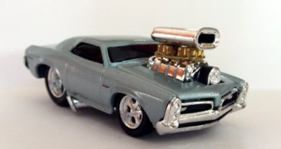 MUSCLE MACHINES 1966 PONTIAC GTO - 1/64  DIECAST 66 GTO  - - Image 1 of 4