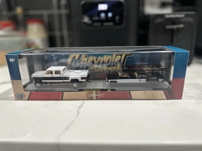 1/64 R87 M2 签名 Haulers 1998 GMC Sierra 1500 4x4 & 1973 GMC Jimmy Sierra 4x4 — 第 1/4 张图片