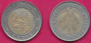 GHANA 100 CEDIS 1999 XF COCOA BEANS WITHIN CIRCLE,RAMPANT LOIN AT CENTER OF QUAR - Picture 1 of 1