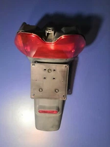 Codino porta targa con faro Piaggio Skipper - Picture 1 of 2