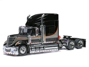Trattore camion International Lonestar 2010 nero con strisce argento 1/64 pressofuso - Foto 1 di 3