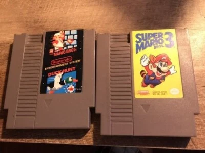Nintendo NES Super Mario Bros/Duck Hunt and Super Mario Bros 3 Games &Top Gun  - Image 1 of 3