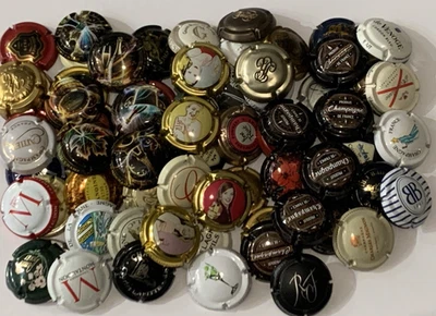125 differentes capsules  champagne - Photo 1/4