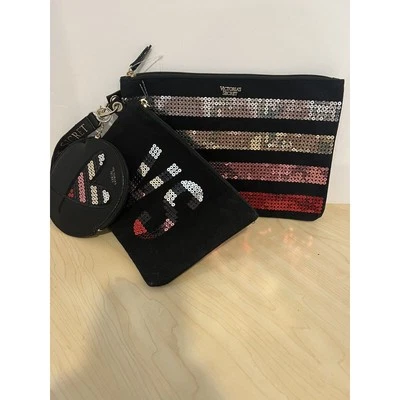 NUEVO CON ETIQUETAS SET BOLSO CLUTCH VICTORIA’S SECRET CREMALLERA/MUÑEQUERA/LLAVERO-Negro/Lentejuelas de Colores Foto 1 de 4