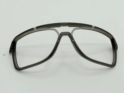 GAFAS DE SOL OAKLEY CASTEL GRIS TRANSLÚCIDO HUMO REPUESTO MARCO FRONTAL ORBITALES Foto 1 de 4