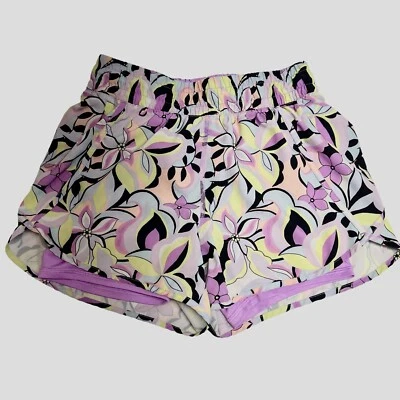 Pantalones cortos de correr AVIA florales para mujer con forro de bicicleta talla pequeña Foto 1 de 4