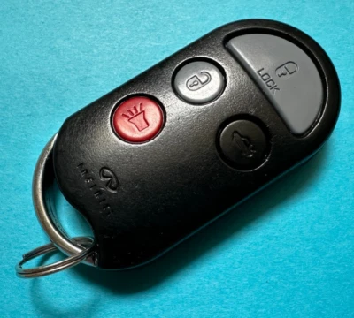 OEM 1997-2001 INFINITI Q45 MANDO A DISTANCIA ENTRADA SIN LLAVE 4 BOTONES KBRASZU07 ~ ¡¡COMO NUEVO!!! Foto 1 de 4