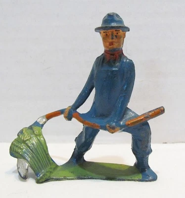 MANOIL HAPPY FARM SERIE GRANJERO CORTE CON GUADAÑA FIGURA PLOMO 41/8 DE COLECCIÓN Foto 1 de 2