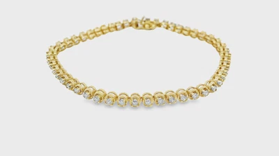 Brazalete de tenis de diamantes naturales de corte brillante redondo de oro amarillo de 14 k de 1,50 quilates J/I1 Foto 1 de 4