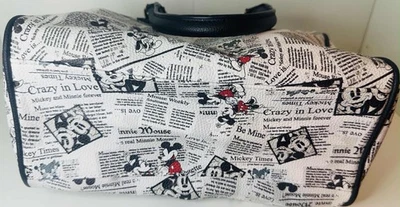 Cartera monedero con papel de periódico de Mickey y Minnie Mouse de los parques de Disney Foto 1 de 4