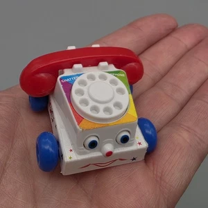 Fisher Price kleinstes Geschwätztelefon der Welt Miniatur Spielzeugtelefon 2019 - Bild 1 von 14