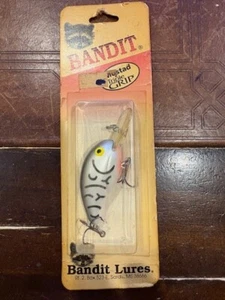 Pre-Pradco Bandit 200 - Lg. Red Pack mit Triple Grip - Pearl Black Craw - 246 - Bild 1 von 1