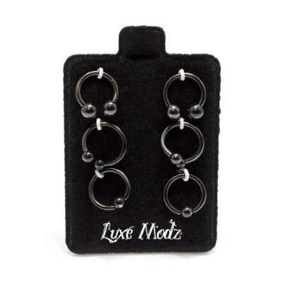 Paquete de 6 anillos de cuentas cautivas calibre 16 herradura barra circular torcida negro CBR labio Foto 1 de 4