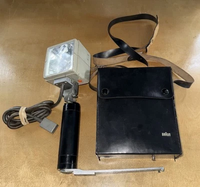 Unidad de flash electrónica marrón vintage para bolsa de fotografía Foto 1 de 3