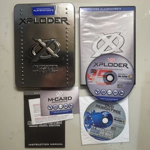 SELTEN PS2 XPLODER V5 Cheat SYSTEM PRO im Steelbook Case Region Free DVD Player - Bild 1 von 7