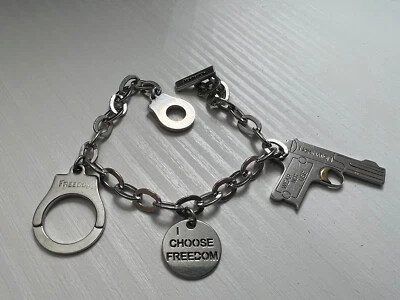 Braccialetto Gioielli Nomination "I CHOOSE FREEDOM" Uomo manette pistole - Immagine 1 di 3