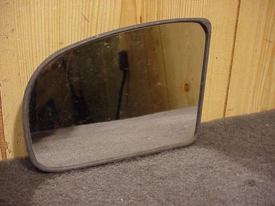 HYUNDAI EXCEL 90-91 MITSUBISHI PRECIS 90-91 MANUAL ESPEJO CRISTAL DRIVER IZQUIERDO  Foto 1 de 2