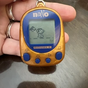 Nano Pets Double Virtual Pets Playmates 1997 orange funktioniert - Bild 1 von 4