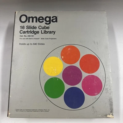 Biblioteca de cartuchos Omega 16 Slide Cube para proyector Bell & Howell Slide Cube Foto 1 de 3