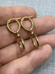 JCM Jacmel Gold Stainless Steel Twist Infinity Hoop Snap Earrings - Picture 1 of 5
