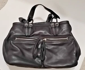 Bolso TUMI de cuero suave negro con asa superior 2 bolsillos delanteros compartimentos  - Imagen 1 de 10