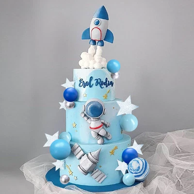 Estatuillas de astronauta del espacio exterior Space Cake Toppers bolas de cohete y estrellas niño... Foto 1 de 4