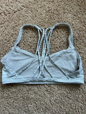 Sujetador deportivo Lululemon Free to Be talla 2 rayas blancas y grises Foto 1 de 4