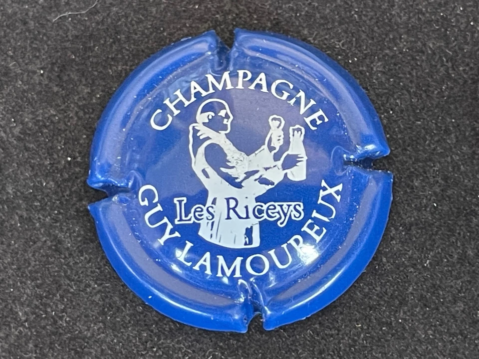 capsule de champagne "guy lamoureux NR bleu et blanc " côte de ? euros - Photo 1/1