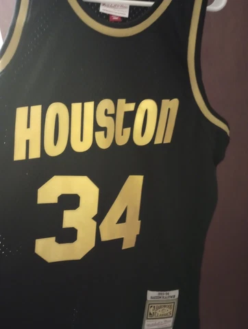 Hakeem Olajuwon 1993-94 Mitchell & Ness Rockets Black Gold Hardwood classics Cover