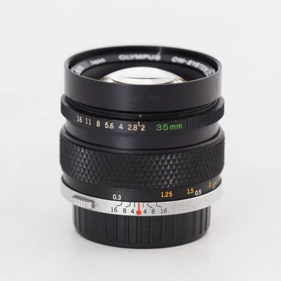 Olympus OM-System Zuiko MC Auto-W 35mm f/2 lente gran angular #13478 - Imagen 1 de 4