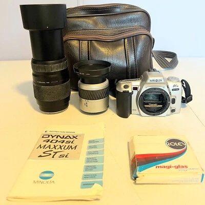 Cámara MINOLTA Dynax 404si MAXXUM ST con 2 lentes estuche manual 3 lentes filtro película Foto 1 de 4