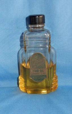 Botella parcial Art Deco vintage rara de aceite para el cabello de La Green años 40 Foto 1 de 4
