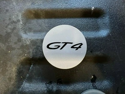 Porsche Cayman GT4 2016 tapa central tapacubos logotipo plateado 9P2601147 8Z8 Foto 1 de 4