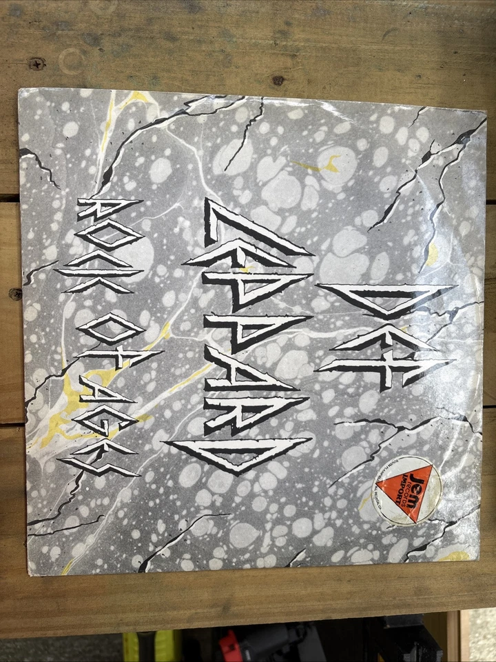 Def Leppard - Rock Of Ages - 1983 UK 7”/PS.  M- - Image 1 of 1