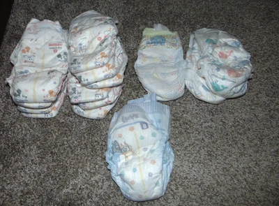 15 Size 7 & 8 Diapers Huggies Snug N Dry Luvs Pampers Cruisers 7 Target Size 8 - Image 1 of 4