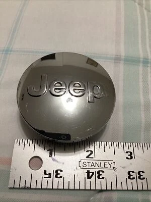 Jeep Grand Cherokee 2008-2020 tapa central 1LB77TRMC 2,5" cromo fabricante original Foto 1 de 4