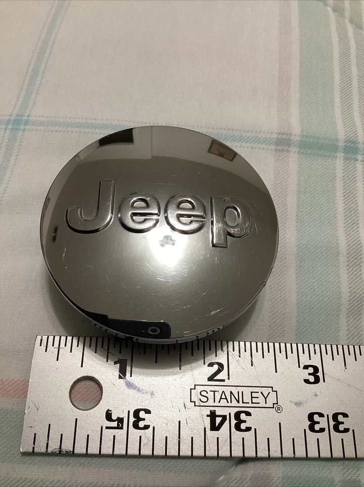 Jeep Grand Cherokee 2008-2020 tapa central 1LB77TRMC 2,5" cromo fabricante original Foto 1 de 4