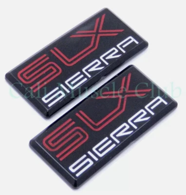 Sierra SLX emblema 1500 2500 3500 cabina pilar techo lateral 88 89 90 91 NUEVO 2 piezas Foto 1 de 2