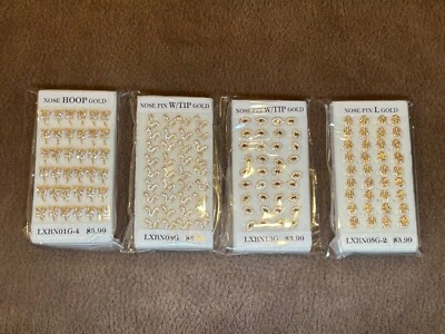 Lote de 144 piezas - 4 paquetes de trozos de nariz y tachuelas de anillo de acero (tono dorado) Foto 1 de 4