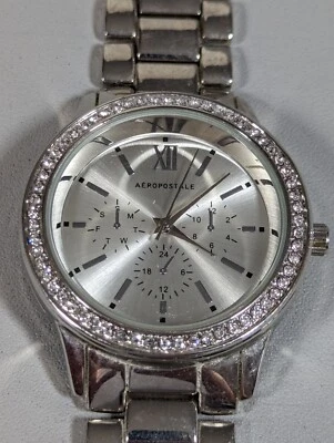 Reloj Aeropostale Tono Plateado Cuadrante Cristal Acento Estuche Redondo Banda Eslabón Foto 1 de 4