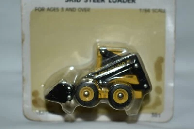Ertl 1:64 New Holland Skid Steel Loader - Image 1 of 3