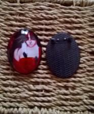 Unusual weird brooch pin / painted woman / black alloy and glass / last one