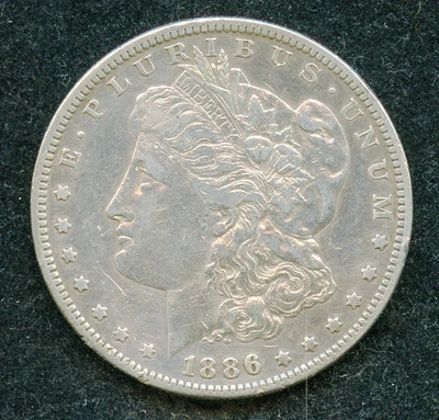 "Scarce Date" 1886-S Morgan Silver $1 VF/XF Details Cleaned w/ Rim Bumps - Image 1 of 2