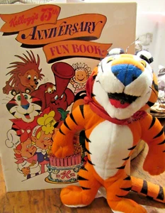 Libro del 75 aniversario de cereales Kellogg's; felpa Tony el tigre; cereal blanco nieve - Imagen 1 de 11