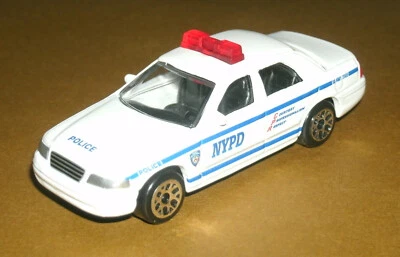 Carro de metal fundido Ford Crown Vic NYPD Police Interceptor escala 1/64 2000 CVPI RealToy - Imagem 1 de 4