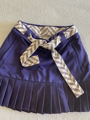 Pantalón corto de golf Nike púrpura  Foto 1 de 4