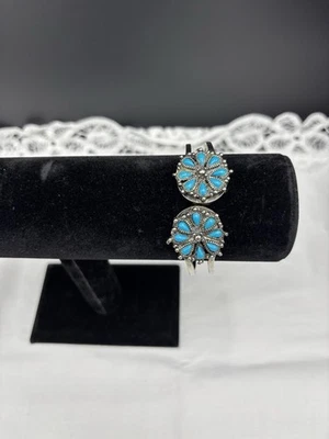 Brazalete brazalete ajustable con bisagras en forma de flor turquesa y plata Foto 1 de 4