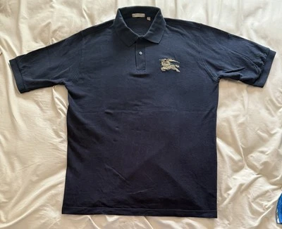 Camisa polo Burberry London para hombre mediana grande con logotipo dorado Foto 1 de 4