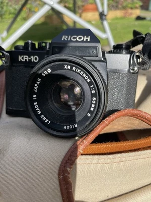Ricoh KR-10 50mm SLR Vintage Film Camera with Owners Manual And Tripod - Image 1 of 4
