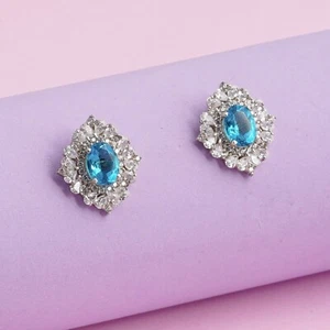 Oval Cut Simulated Blue Topaz Women's Halo Stud Earring In 14K White Gold Plated - Picture 1 of 4